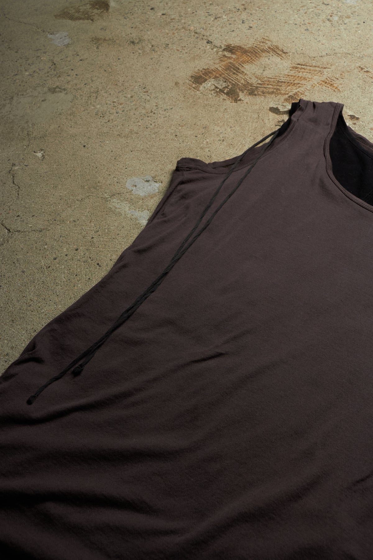DIET BUTCHER SLIM SKIN DOUBLE LAYERED ASYMMETRICAL COTTON TANK TOP WITH TASSLE