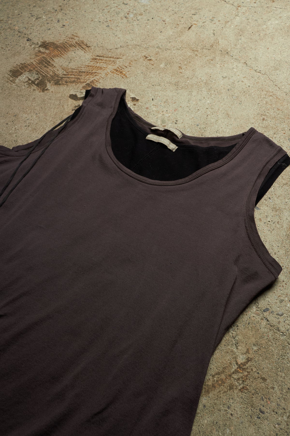 DIET BUTCHER SLIM SKIN DOUBLE LAYERED ASYMMETRICAL COTTON TANK TOP WITH TASSLE