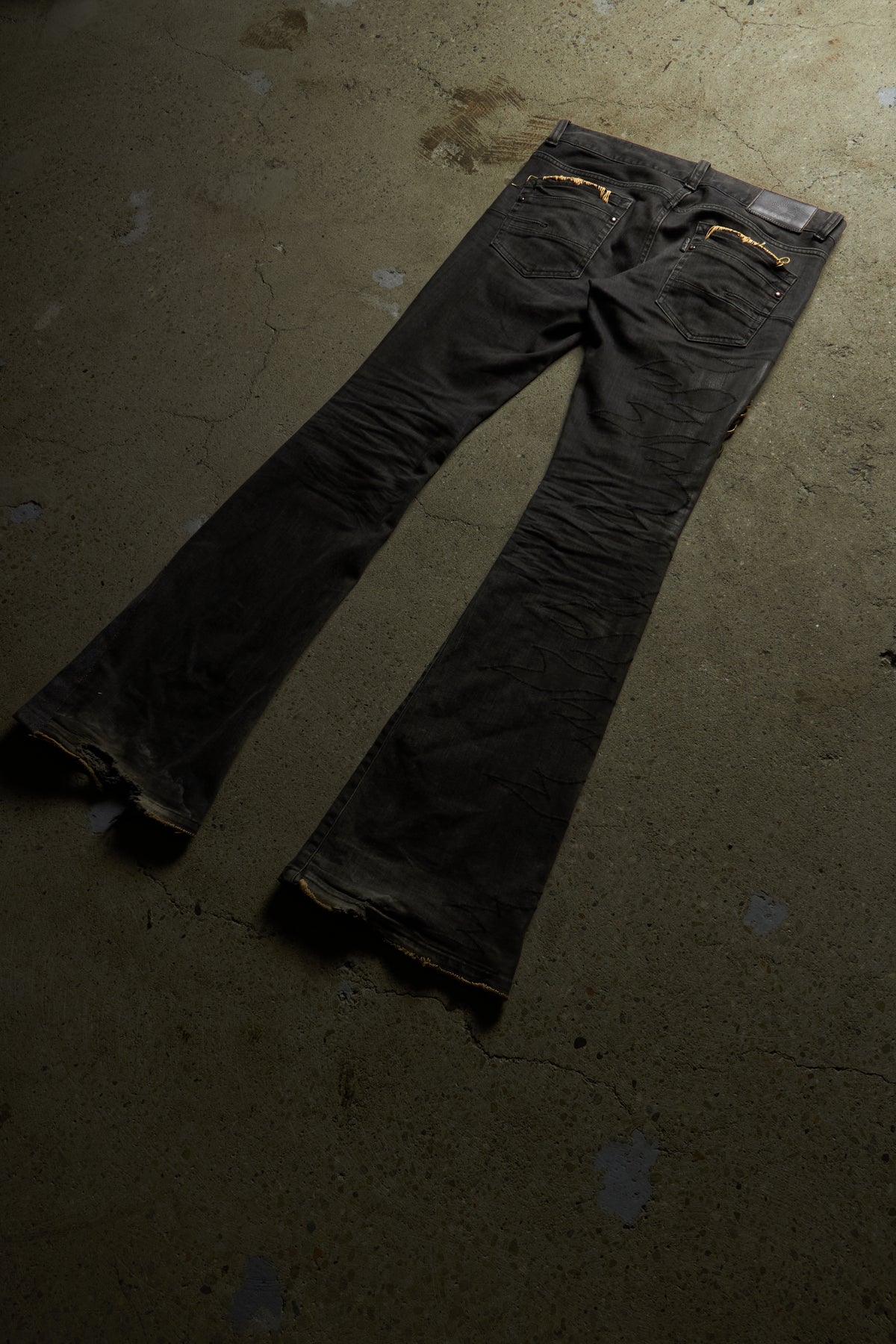 OPAQUE FATE X TORNADO MART PIERCED LEATHER PANEL FLARED DENIM